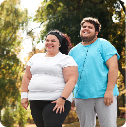 healthy couple after successful weight management treatment